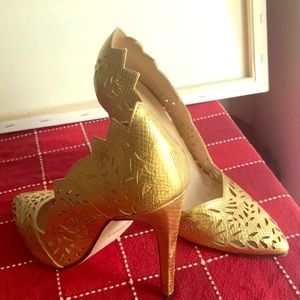 Gold laser cut heels . 4 inch. Excellent condition
